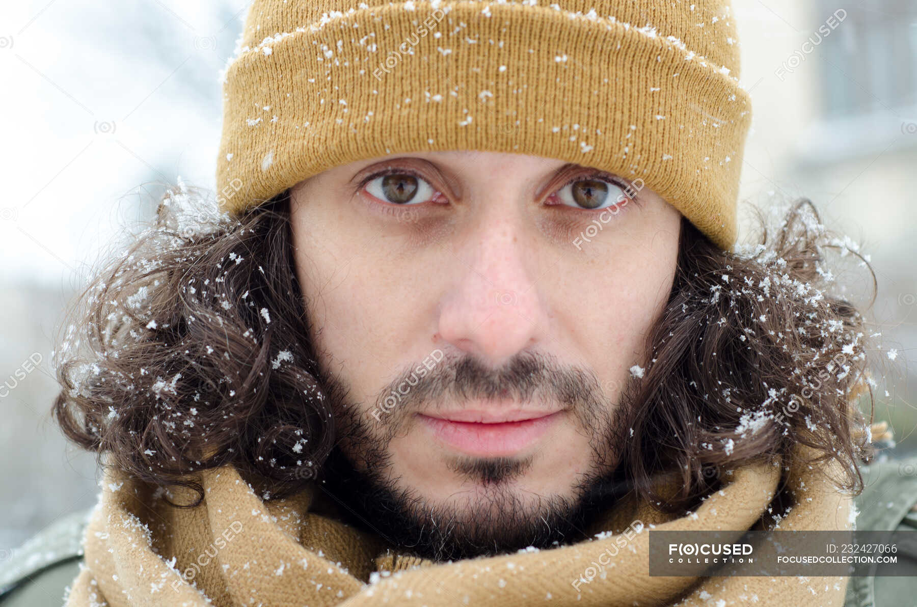 portrait-of-a-man-with-snow-in-his-hair-one-adult-only-snowflakes