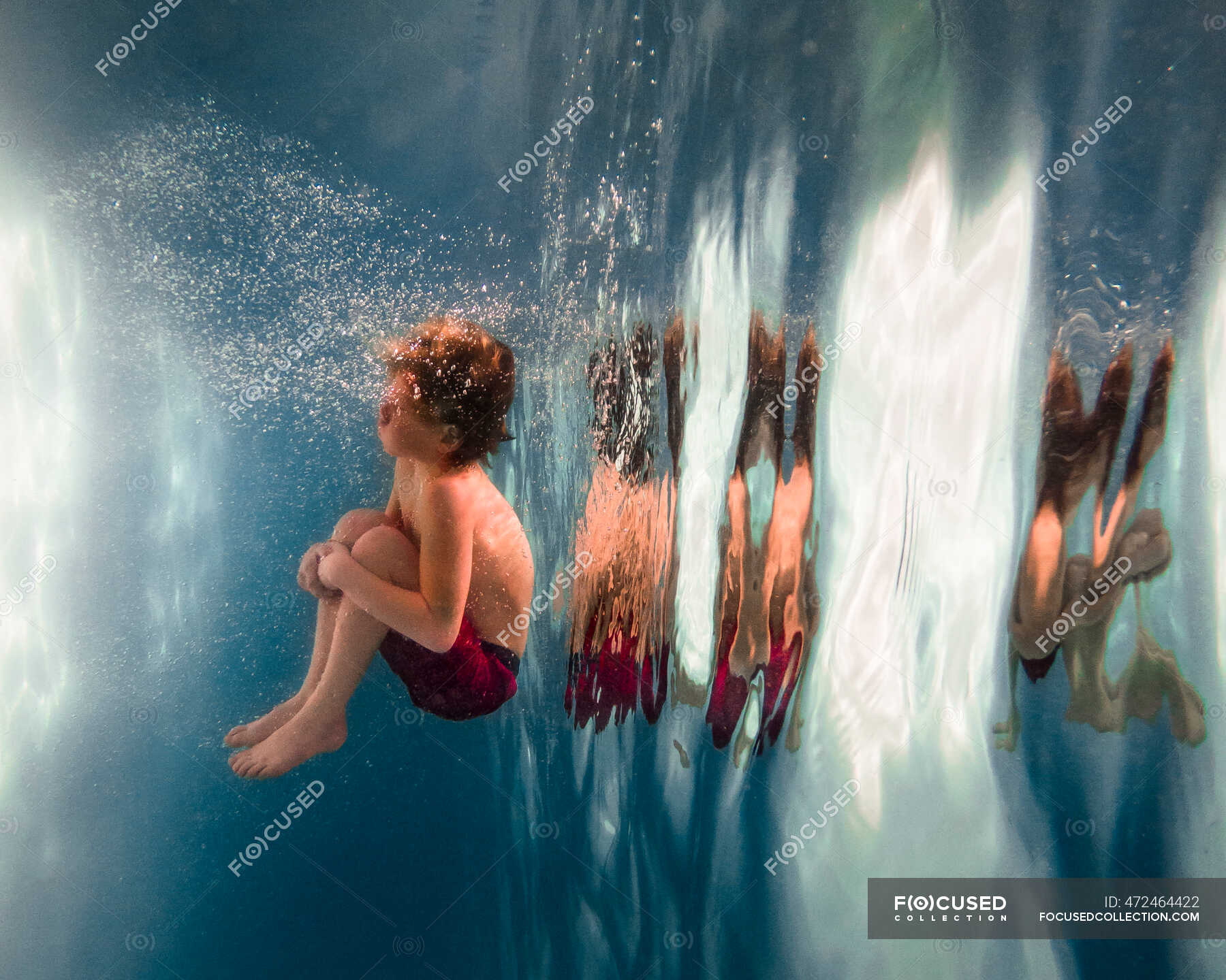 Boy Jumping Into A Swimming Pool — Bubble Cheerful Stock Photo