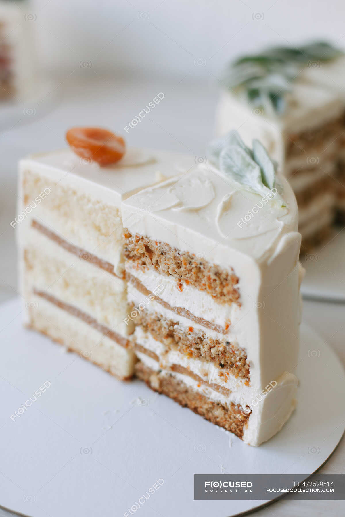 Slices of cake with buttercream icing and fruit — gourmet, copy space