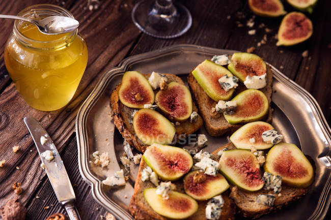 Still life with sandwiches on platter — Stock Photo