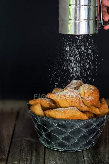 Breakfast pastries with icing sugar — Stock Photo