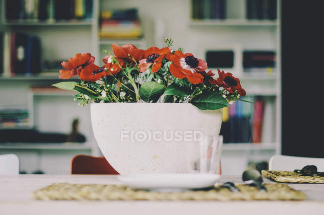 Bouquet of flowers in bowl — Stock Photo