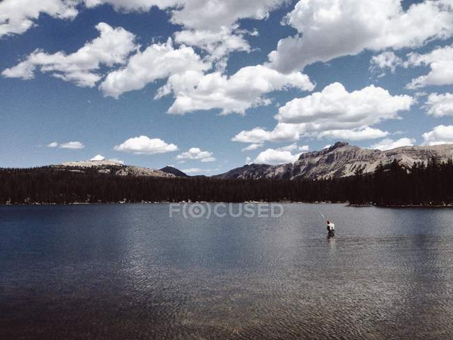 Man fly fishing on Mirror Lake — Stock Photo