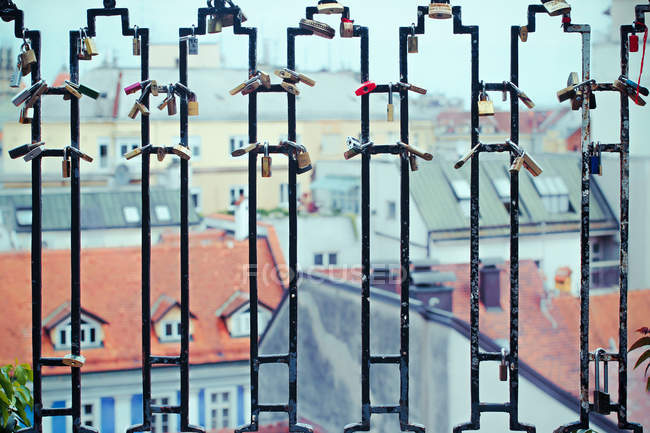 Cityscape from behind bars — Stock Photo