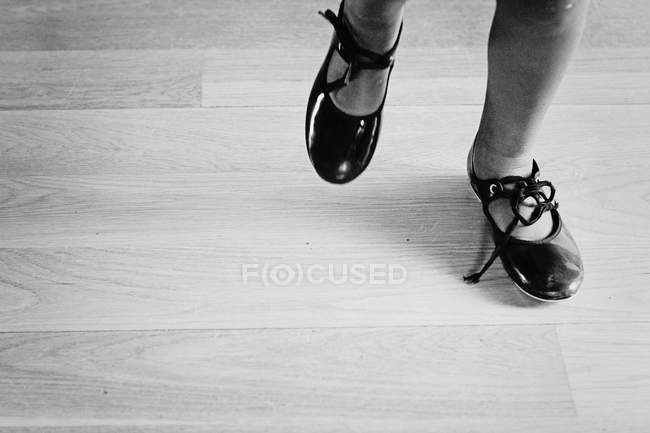 Girl wearing dance shoes — Stock Photo