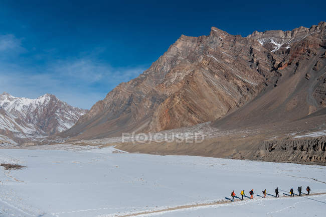Group of trekkers in mountains — Stock Photo