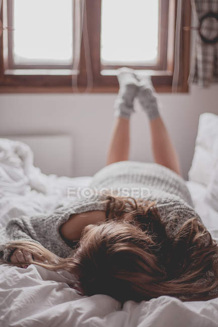 Woman lying face down — Stock Photo