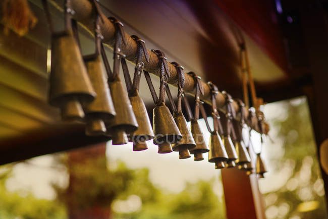 Bells hanging in row — Stock Photo