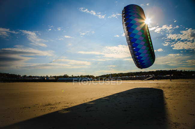 Large kite casting shadow — Stock Photo