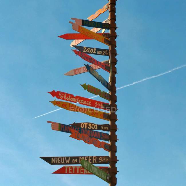 Multi colored directional signs — Stock Photo