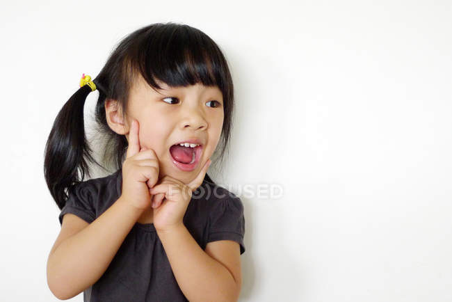 Girl with surprised expression — Stock Photo