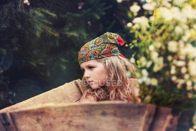 Portrait of girl in traditional headscarf — Stock Photo
