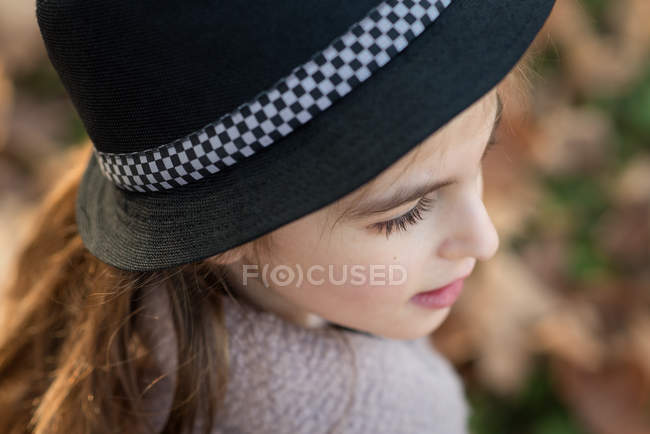 Cute girl in hat — Stock Photo