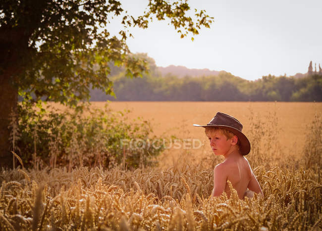 Boy wearing hat standing — Stock Photo