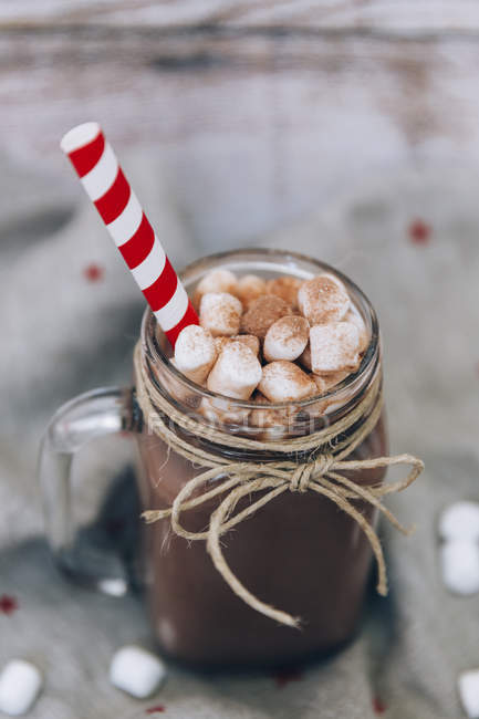Glass jar with hot chocolate — Stock Photo