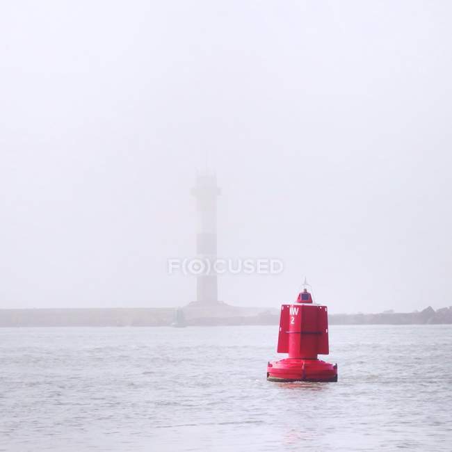 Red navigational buoy — Stock Photo