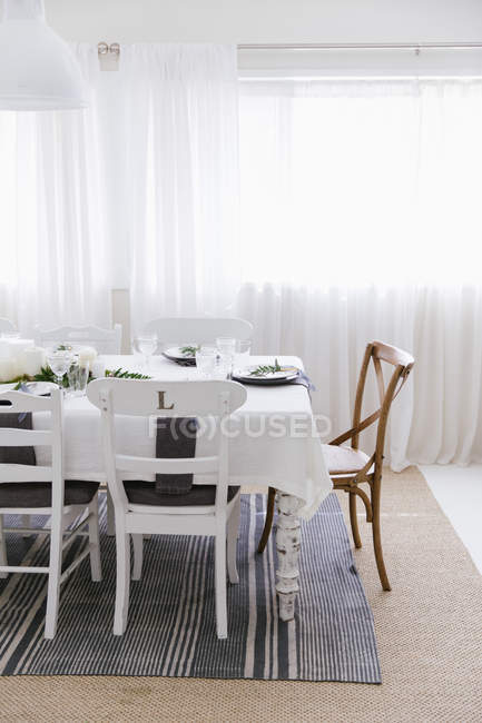 Dining table set for dinner — Stock Photo