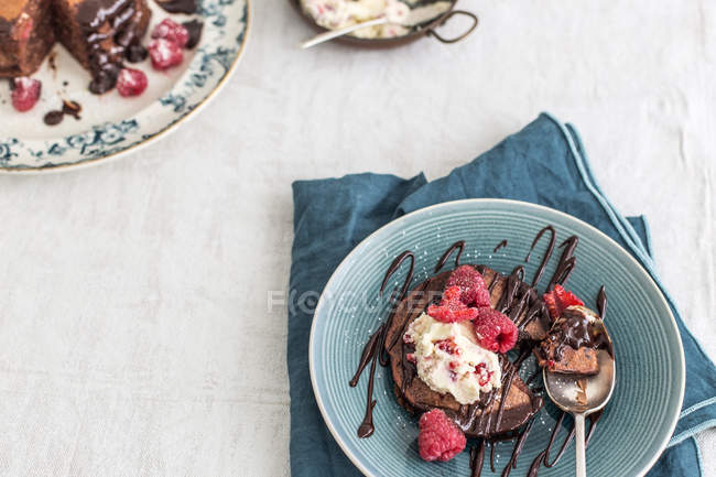 Chocolate pancakes with raspberries — Stock Photo