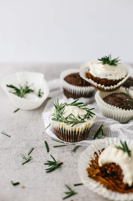 Chocolate muffins with rosemary — Stock Photo