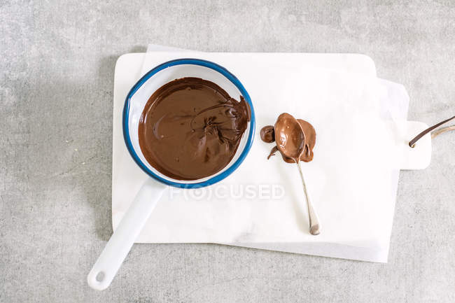 Melted chocolate in pan — Stock Photo
