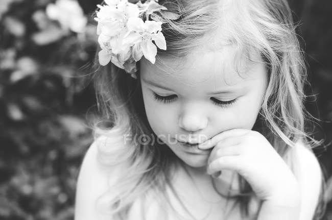 Portrait of girl with flowers — Stock Photo