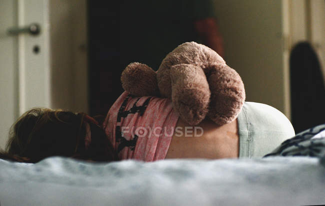 Girl with teddy bear — Stock Photo