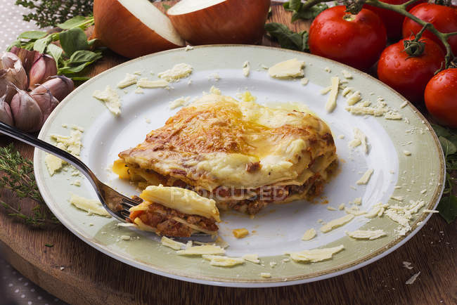 Lasagne with cheese in plate — Stock Photo