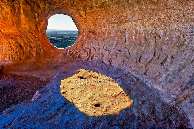 Round hole in cave walls — Stock Photo