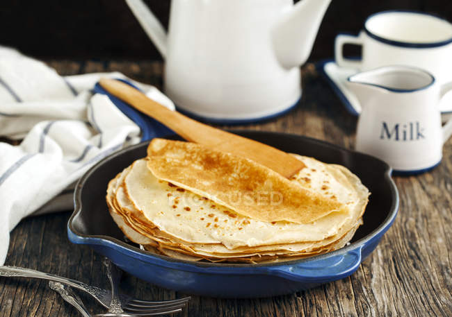 Stack of pancakes in dish — Stock Photo
