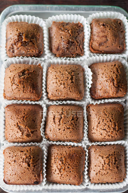 Cakes on baking tray — Stock Photo