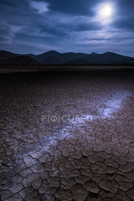 Scenic view of cracked mud in moonlight, Prishtina, Kosovo — Stock Photo