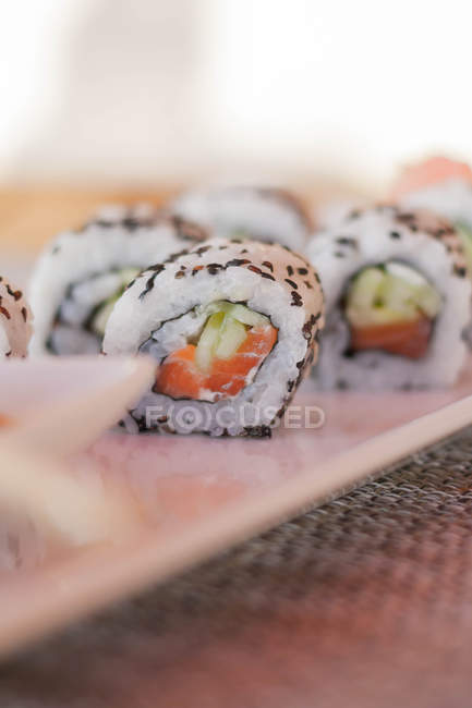 Close-up of traditional sushi california rolls — Stock Photo