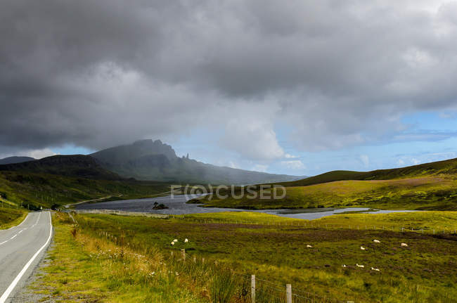 Scenic view of road to Old Man of Storr under dramatic sky, Isle of Skye, Scotland, UK — Stock Photo