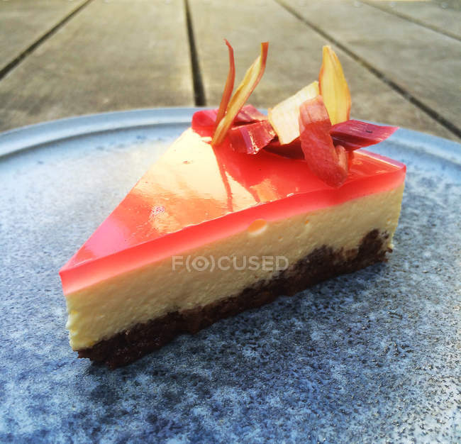 Tasty tempting slice of rhubarb cake on a plate — Stock Photo