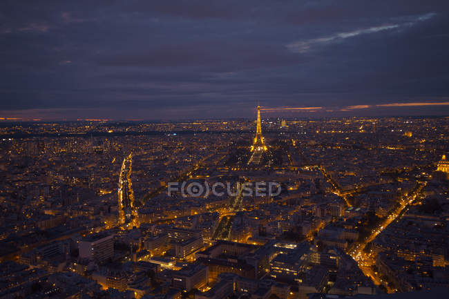 Aerial view of city, Eiffel Tower in background, Paris, France — Stock Photo