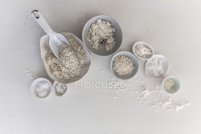 Top view of bowls of kitchen essentials, different crops — Stock Photo