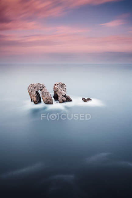 Scenic view of Rocks in sea at El Manzano, Spain — Stock Photo