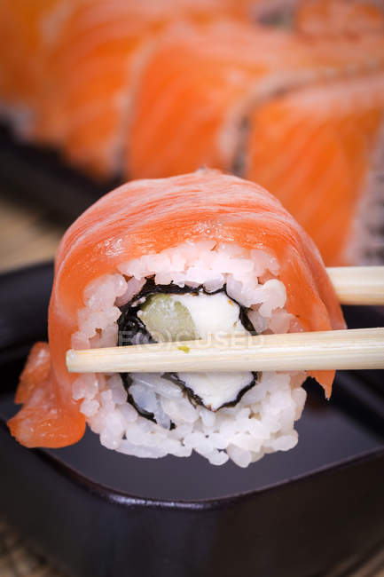 Salmon sushi maki roll, closeup — Stock Photo