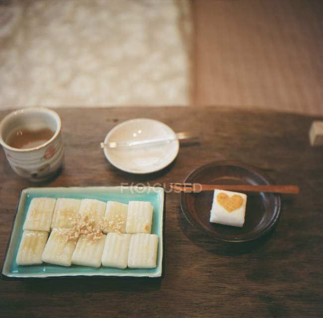 Tasty exotic korean dessert over wooden table — Stock Photo