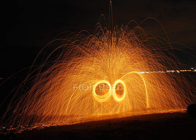 Spinning Wire wool at night time — Stock Photo