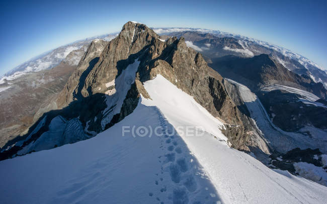 Switzerland, Alps, scenic view of footprints on mountains — Stock Photo