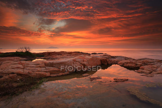 Scenic view of Singkawang under colorful sky, Indonesia — Stock Photo