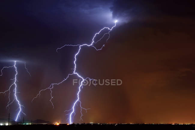 Scenic view of lightning striking in farming area near little town, Hassayampa, Maricopa County, Arizona, USA — Stock Photo