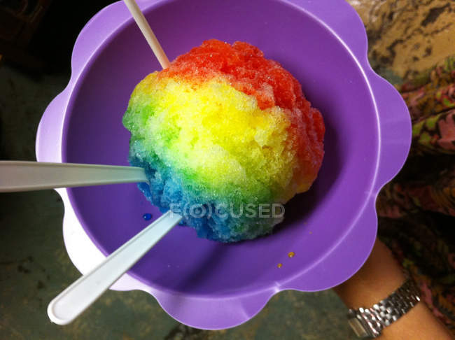 Top view of rainbow ice in purple bowl — Stock Photo