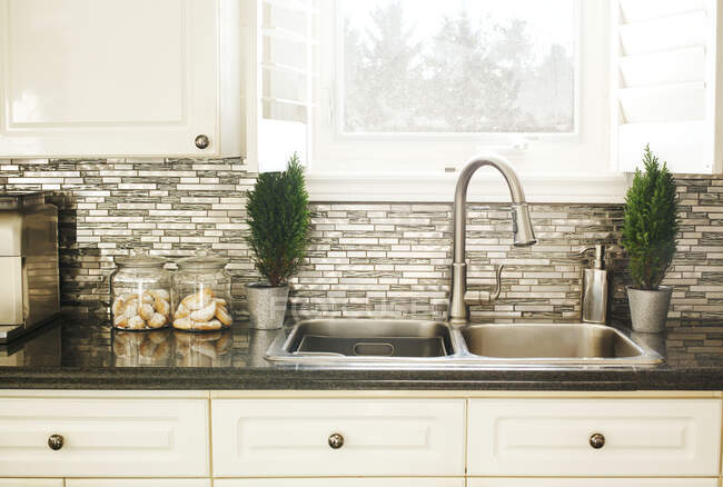 Countertop and sink in modern kitchen — Stock Photo