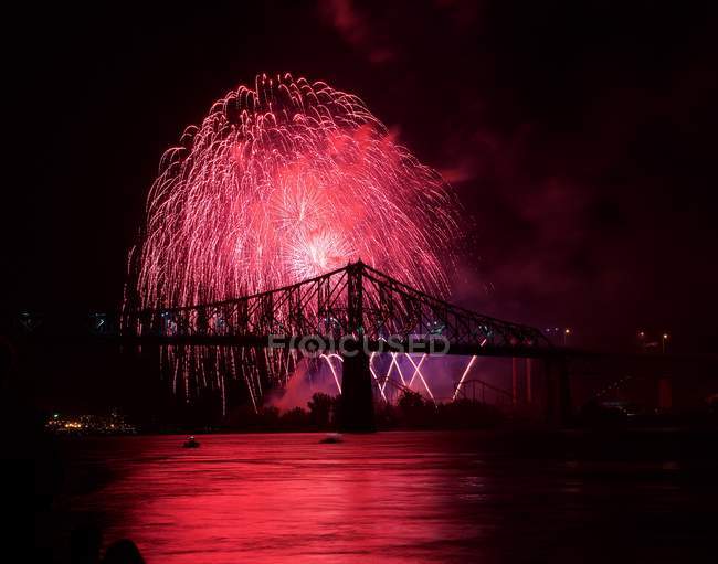 Fireworks over bridge at New Year, Montreal, Canada — Stock Photo