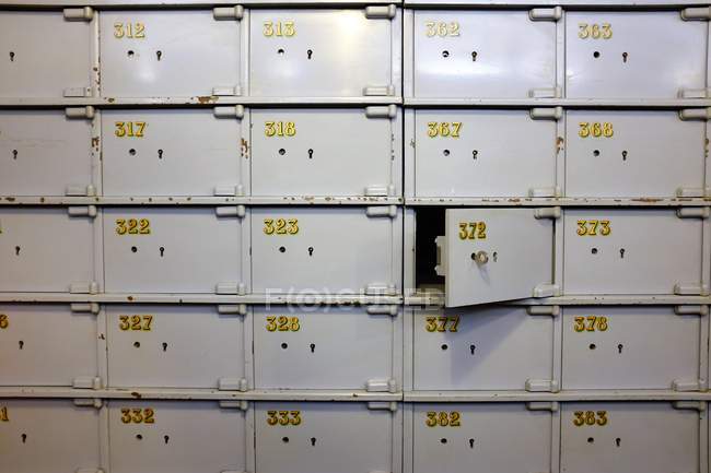 Closeup view of Numbered safe deposit boxes — Stock Photo