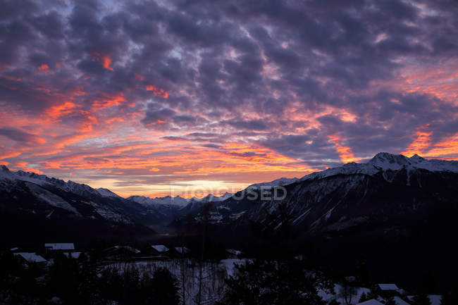 Scenic view of sunrise over mountains, Switzerland — Stock Photo