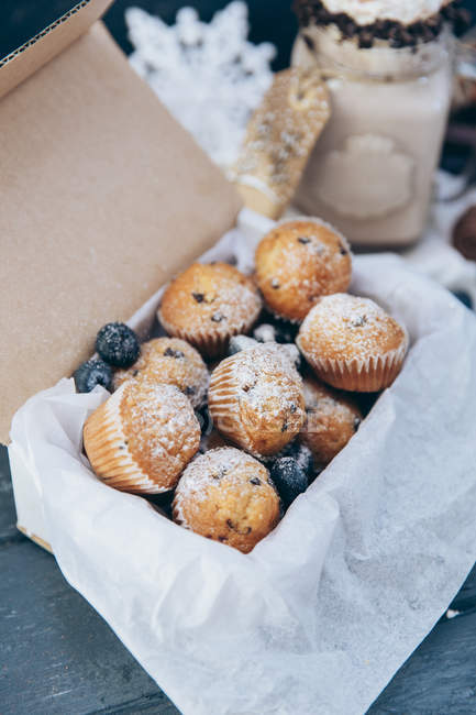 Box of blueberry muffins, closeup view — Stock Photo