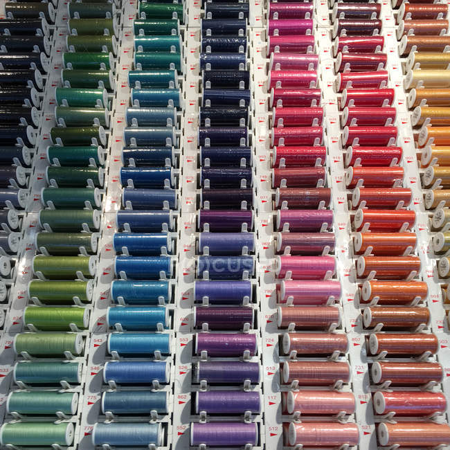 Rows of multi-colored cotton thread — Stock Photo